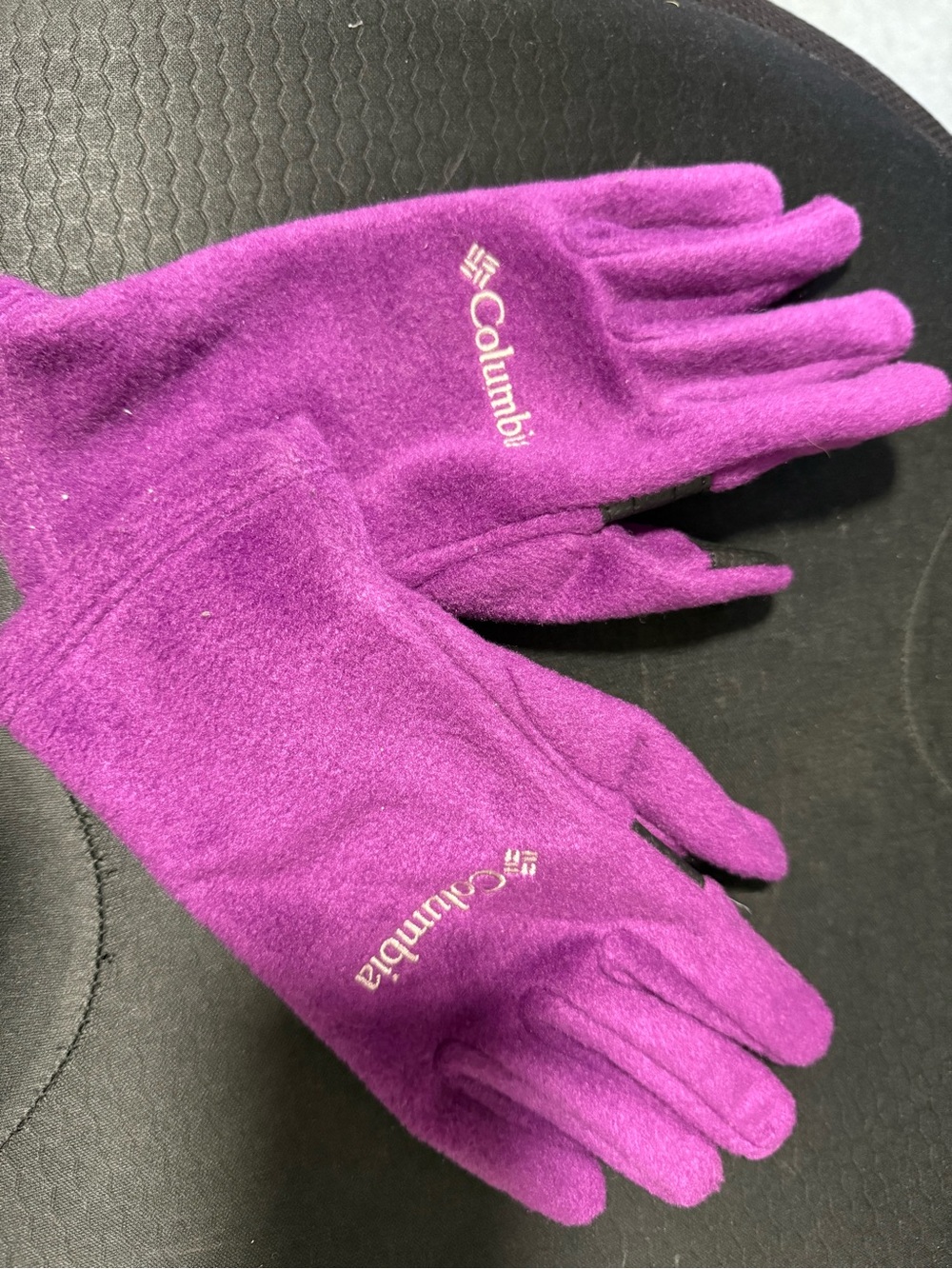 Columbia Sportswear women Thermarator fleece gloves in a bright purple